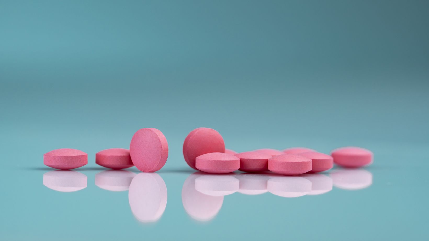 pink round pill k56
