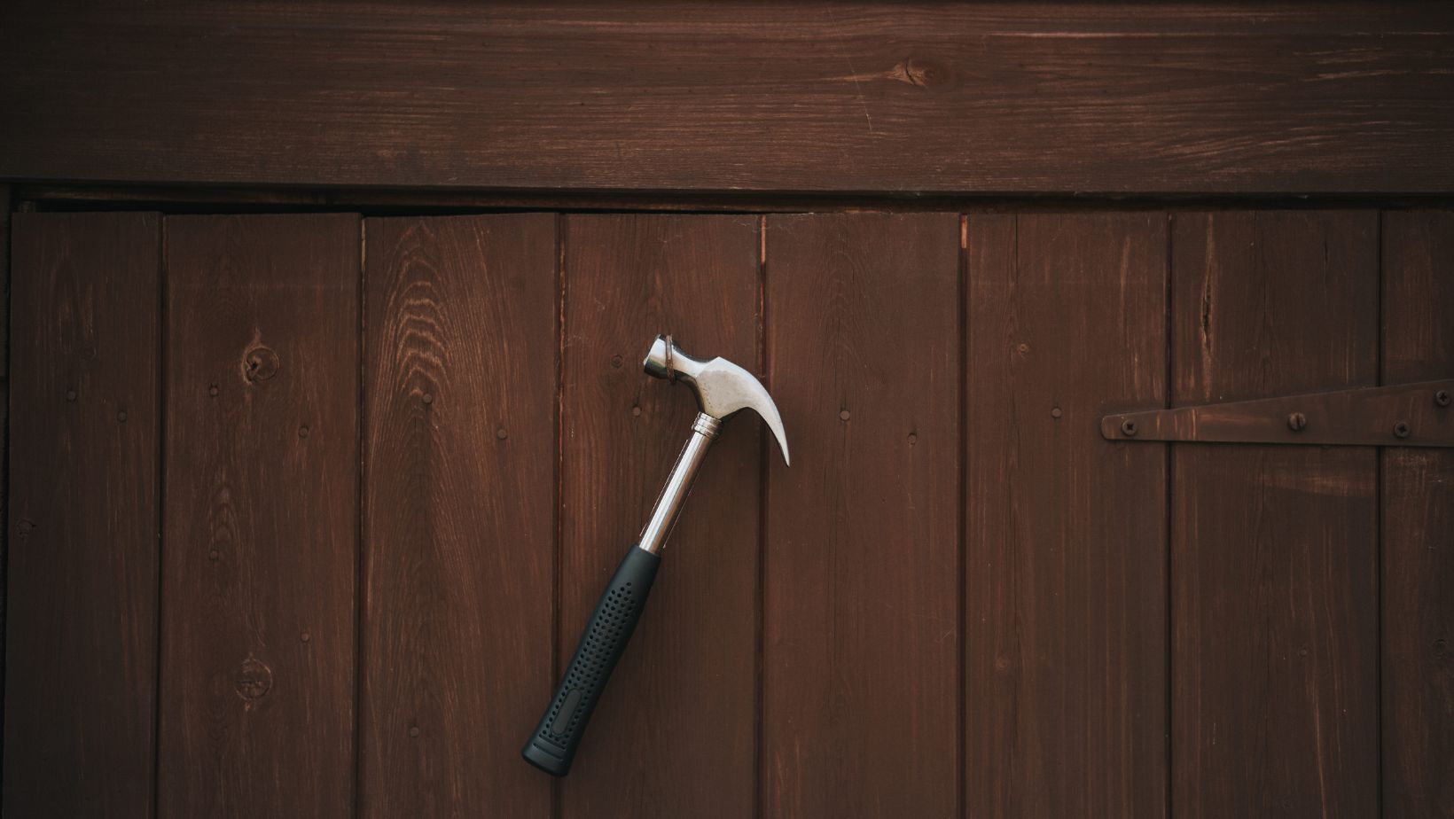 a carpentry hammer with a slightly rounded